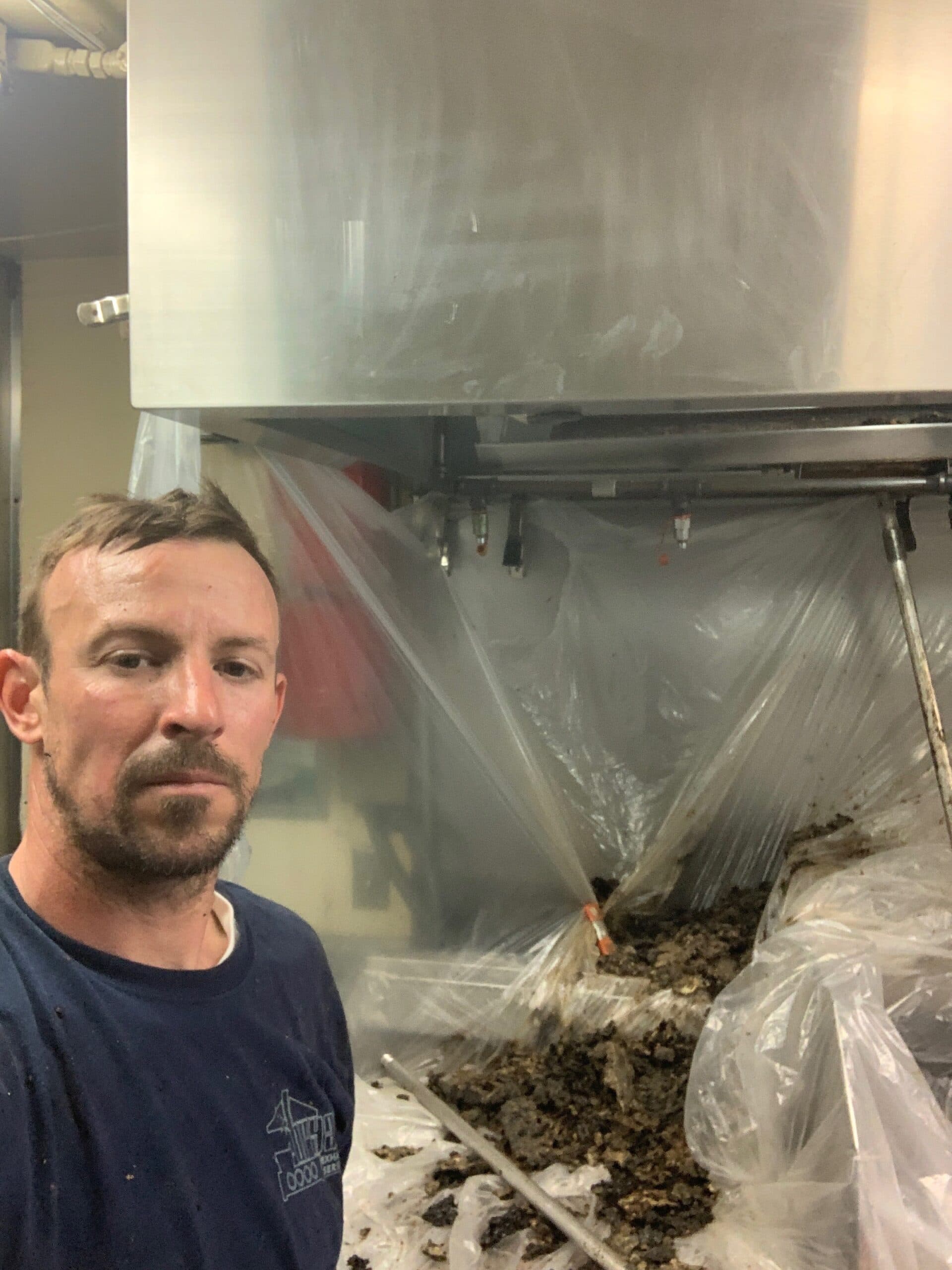 Hood cleaning in progress on a commercial kitchen exhaust