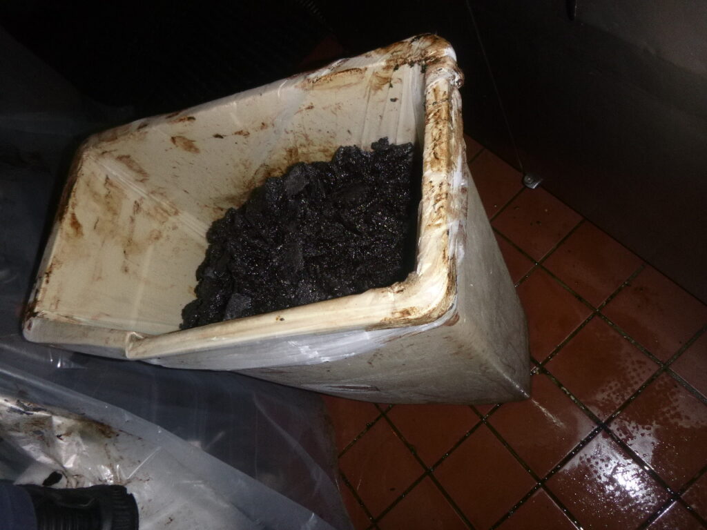 Trashcan full of grease from a West Hollywood kitchen exhaust