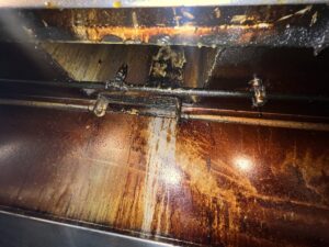 Inside a greasy restaurant exhaust hood in Altadena CA