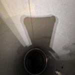 Exhaust duct after cleaning, looking spotless and restored