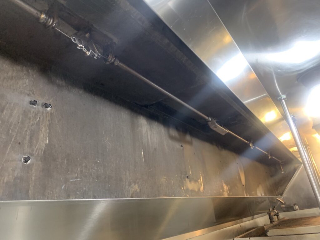 Pristine and restored kitchen exhaust hood after cleaning in Malibu, CA