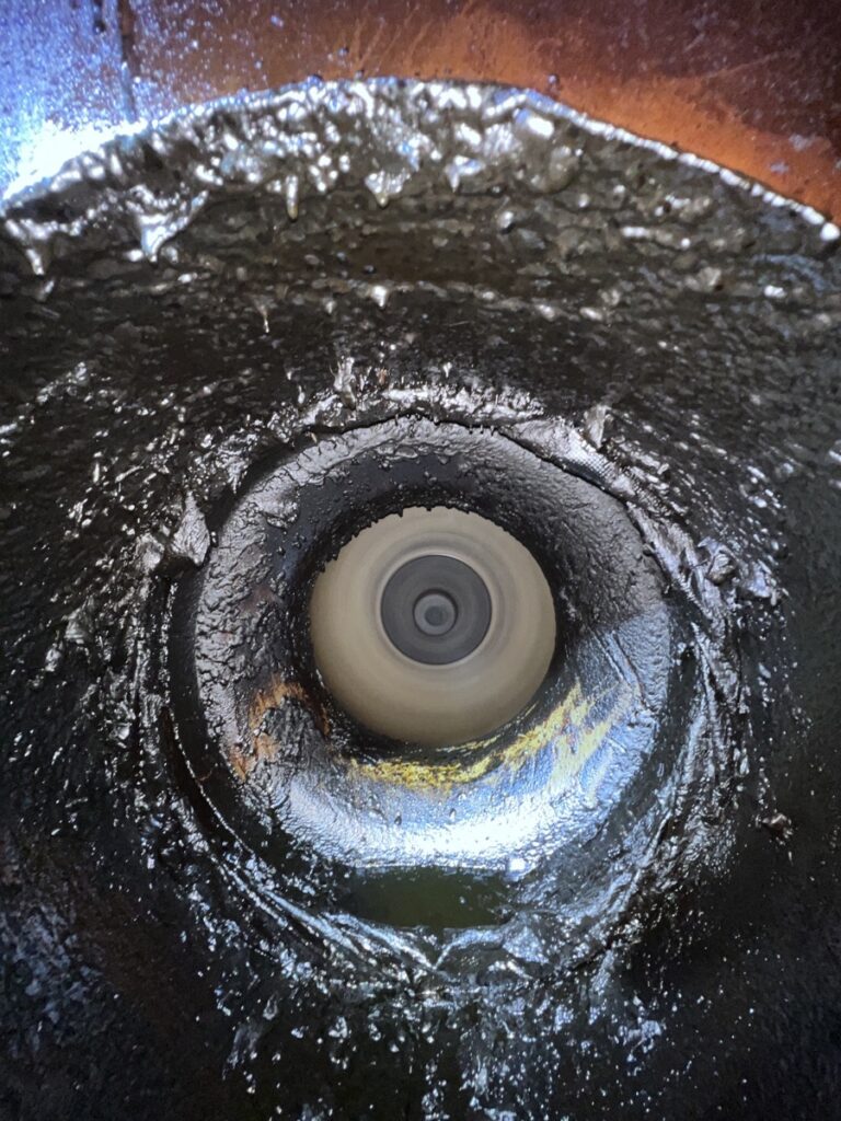Dirty and clogged exhaust fan intake before cleaning in Malibu, CA