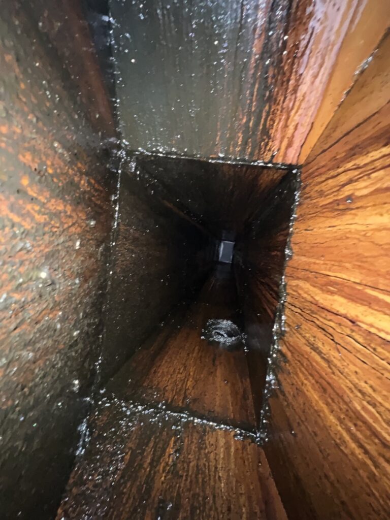 Grease accumulation in vertical duct before cleaning in Malibu, CA